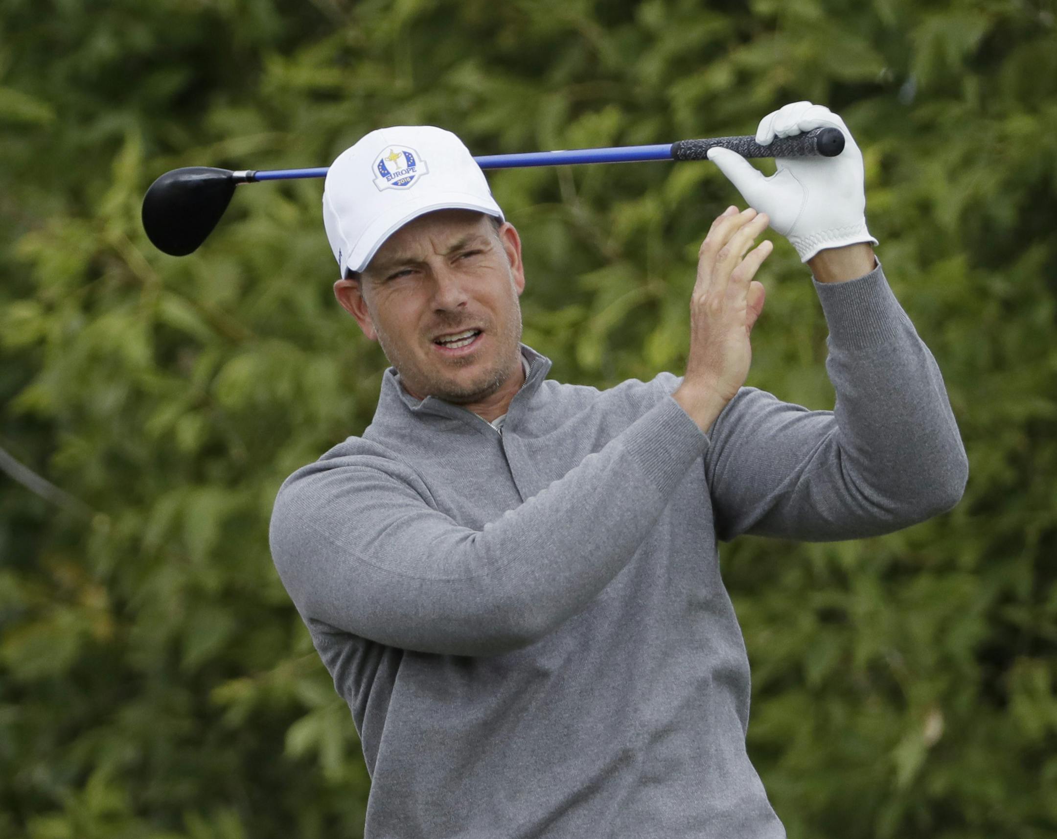 Europe’s Henrik Stenson watches a shot on the 10th hole during a practice round for the Ryder Cup golf tournament Wednesday, Sept. 28, 2016, at Hazeltine National Golf Club in Chaska, Minn. (AP Photo/David J. Phillip)