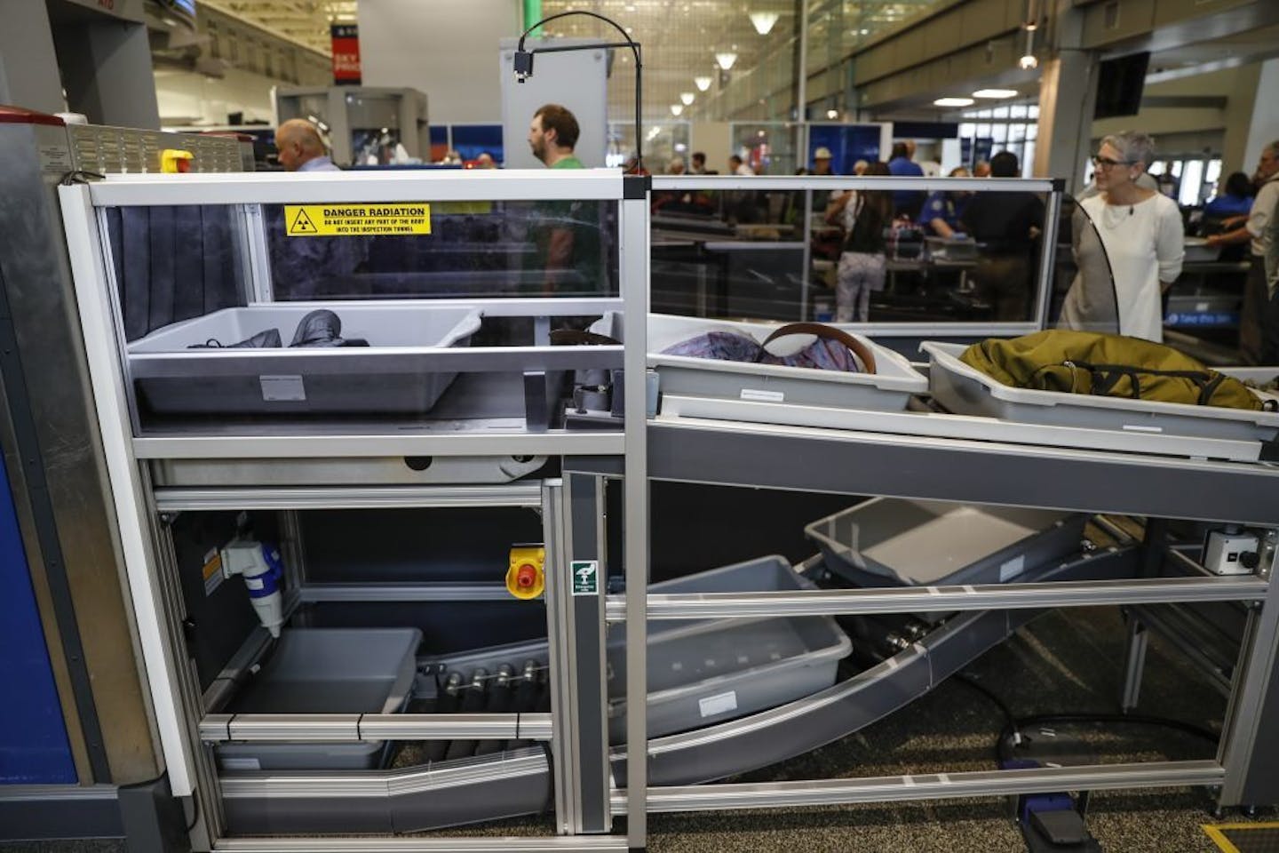 Luggage is now externally photographed in new larger bins with radar chips at the South TSA checkpoint at Terminal 1 at the Minneapolis/St. Paul International Airport on Tuesday in Blommington.