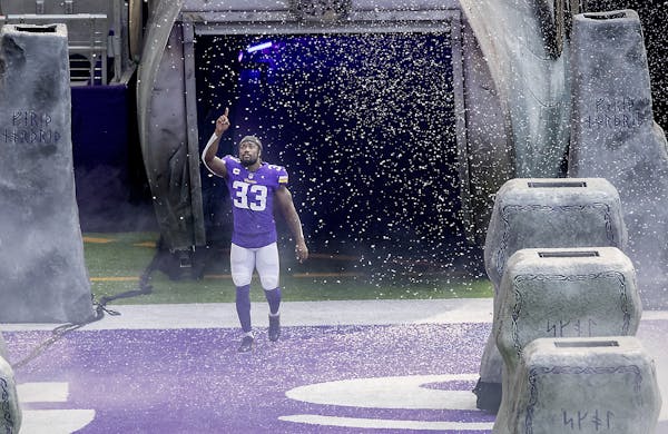 Minnesota Vikings running back Dalvin Cook ran out onto the field before the Vikings took on the Green Bay Packers at US Bank Stadium, Sunday, Septemb