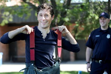 Jacob Frey, current Minneapolis City council member and mayoral candidate, worked the crowd at Open Streets Minneapolis on West Broadway. Here, Frey t