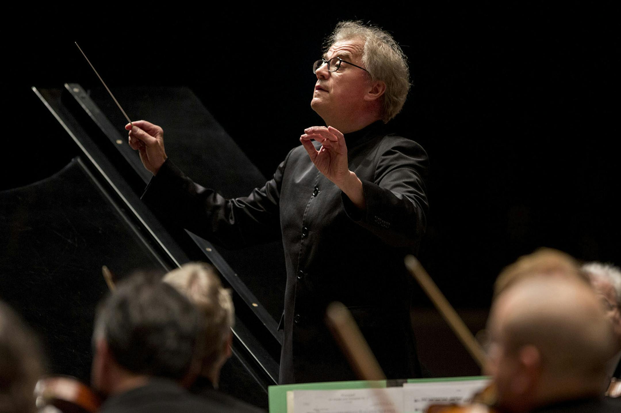 Osmo Vanska conducts members of the Minnesota Orchestra during a performance at the Ted Mann Concert Hall in Minneapolis, Oct. 4, 2013. The musicians, embroiled in a heated battle with management, held a weekend concert series on their own. (Jenn Ackerman/The New York Times) ORG XMIT: MIN2013100712485615 ORG XMIT: MIN1310071307152574