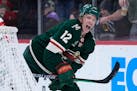 Minnesota Wild left wing Matt Boldy (12) celebrates after scoring a goal against the Philadelphia Flyers during the third period of an NHL hockey game