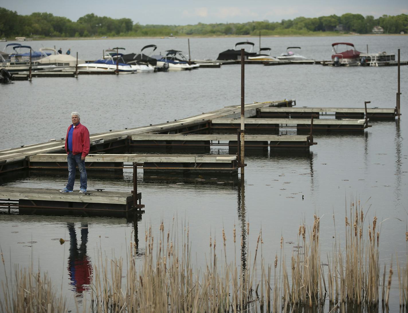 Brian McGoldrick, who owns Admiral D's Waterfront Tavern and the adjacent marina, The Docks of White Bear Lake, is grateful the water levels of White Bear Lake have improved, from what they were a couple of years ago. He was photographed on his docks Thursday afternoon, May 12, 2016.