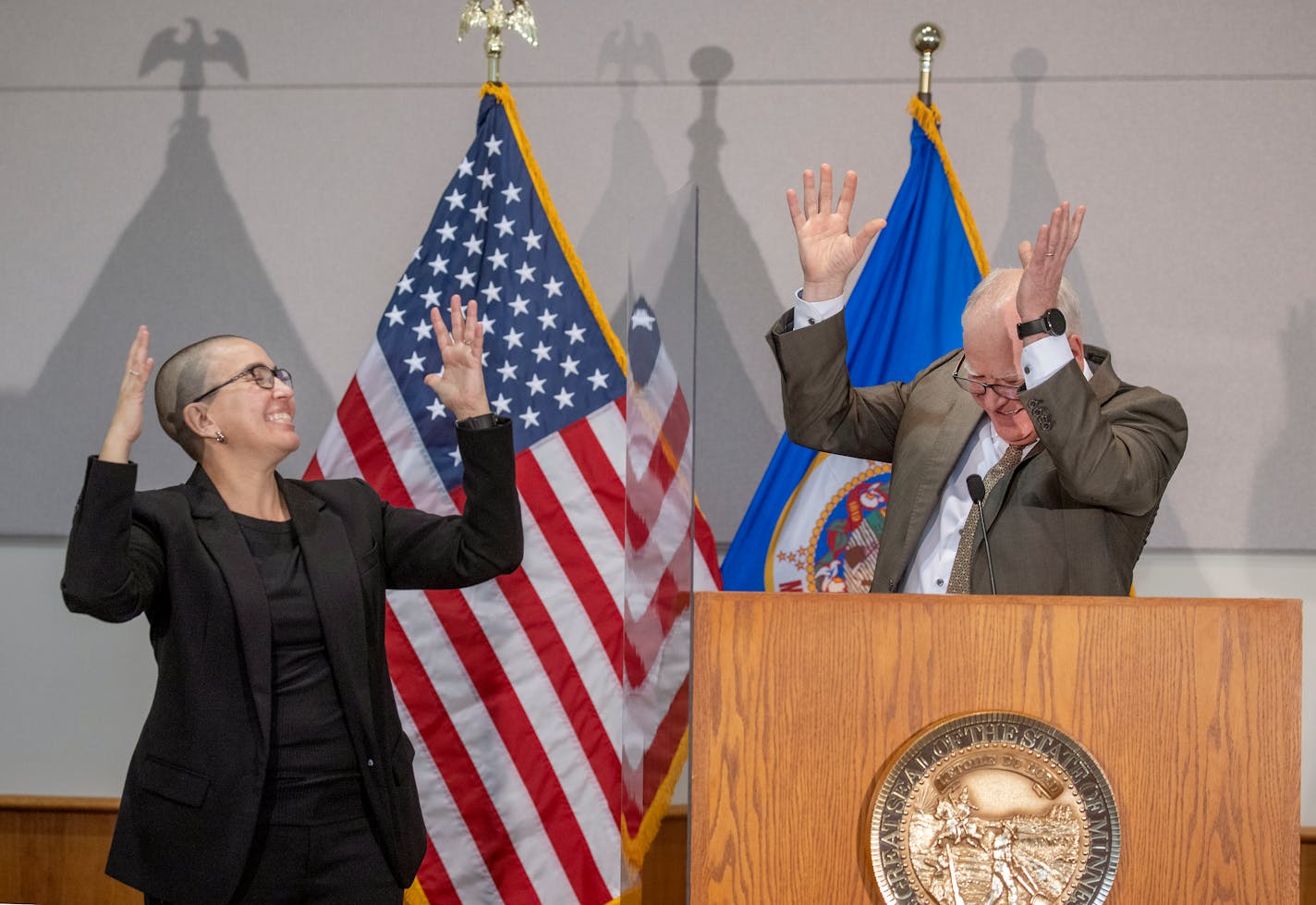 Minnesota Governor Tim Walz surprised Sign Language Translator Nic Zapko proclaiming it "Nic Zapko Day" on her birthday after he addressed the media regarding the distribution of the COVID-19 vaccine during a press conference, Tuesday, March 9, 2021 in St. Paul, MN. ] ELIZABETH FLORES • liz.flores@startribune.com