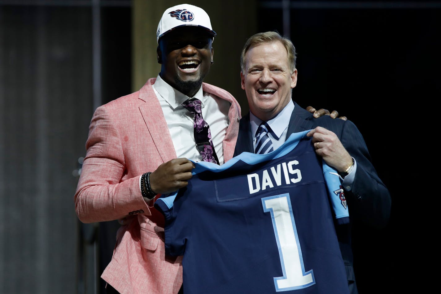 Western Michigan's Corey Davis, left, poses with NFL commissioner Roger Goodell