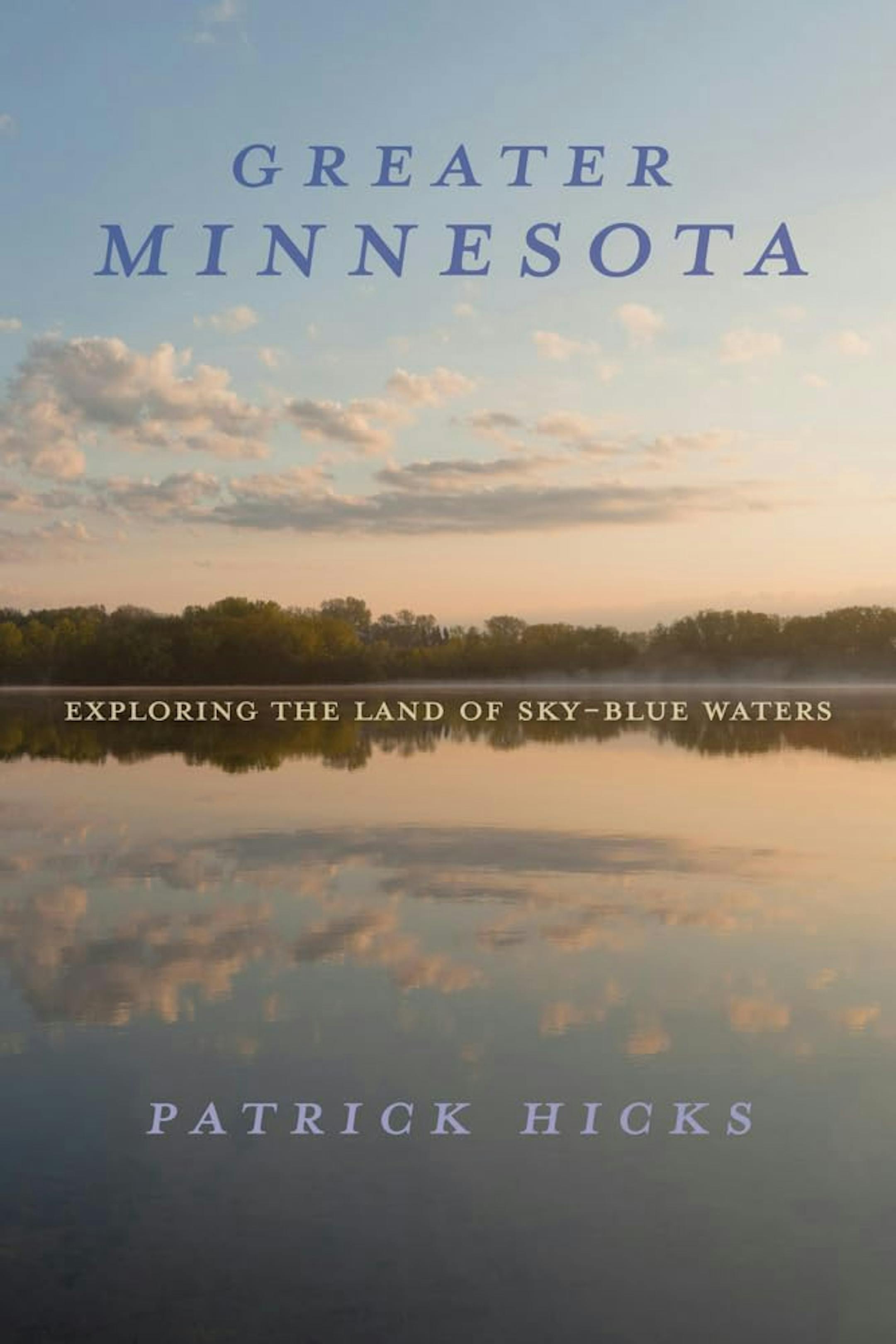 cover of Greater Minnesota is a photo of land and sky reflected in a lake