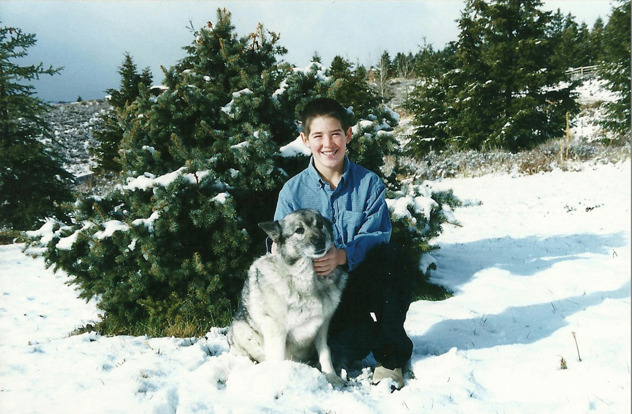 Twins minor league pitcher Tim Shibuya as a child with his dog. Photo provided by Nancy Shibuya.