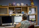 Pam Bluhm worked on putting the newspaper together in her office, Monday, August 3, 2020 in Chatfield, MN. Bluhm worked at the Chatfield News for near