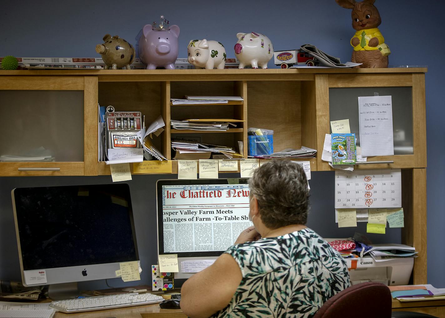 Pam Bluhm worked on putting the newspaper together in her office, Monday, August 3, 2020 in Chatfield, MN. Bluhm worked at the Chatfield News for nearly half of its 96-year history. When the newspaper serving Olmsted and Fillmore counties closed earlier this year, Bluhm was out of a job. With encouragement from friends and neighbors, she resurrected the paper with her stimulus check and now is singlehandedly keeping it alive. ] ELIZABETH FLORES • liz.flores@startribune.com