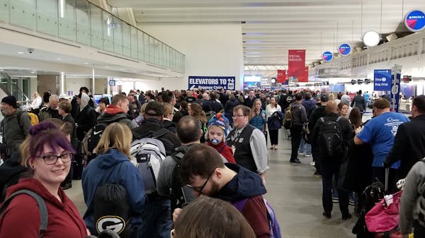 Security lines at MSP were filled with holiday-weekend travelers Friday morning, Jan. 18, 2019.