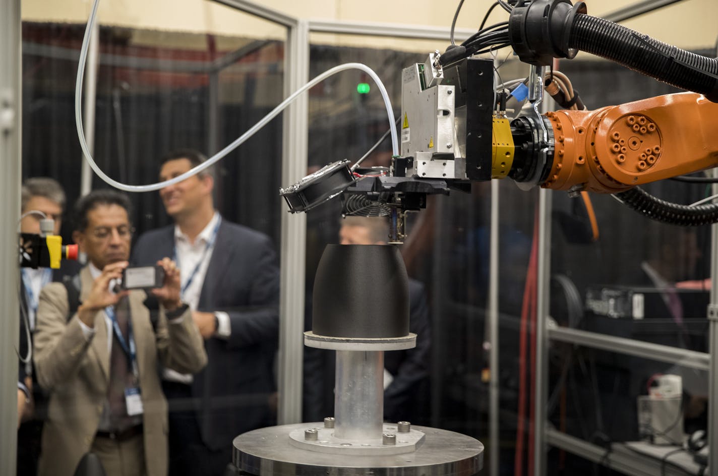 Roopinder Tara of Engineering.com took a picture of a new Stratasys machine making a simple ribbed dome at Stratasys headquarters on August 23, 2016, in Eden Prairie, Minn. ] RENEE JONES SCHNEIDER &#x2022; renee.jones@startribune.com