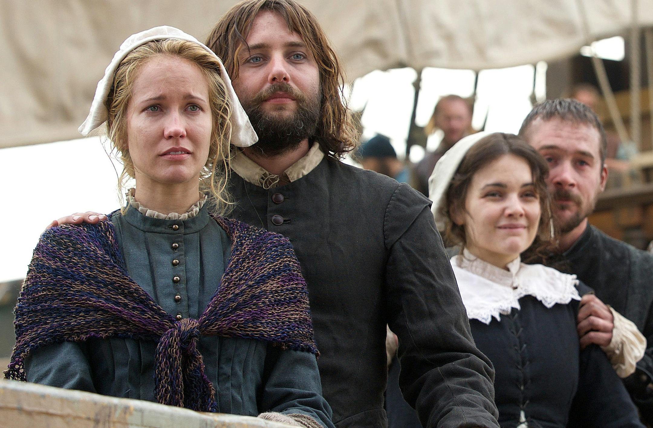 Anna Camp (Dorothy Bradford), William Kartheiser (William Bradford), Maria Vos (Elizabeth Winslow) and Barry Sloane (Edward Winslow) onboard the Mayflower in National Geographic Channel's upcoming movie event "Saints & Strangers," premiering this fall. (photo credit: National Geographic Channels/David Bloomer)