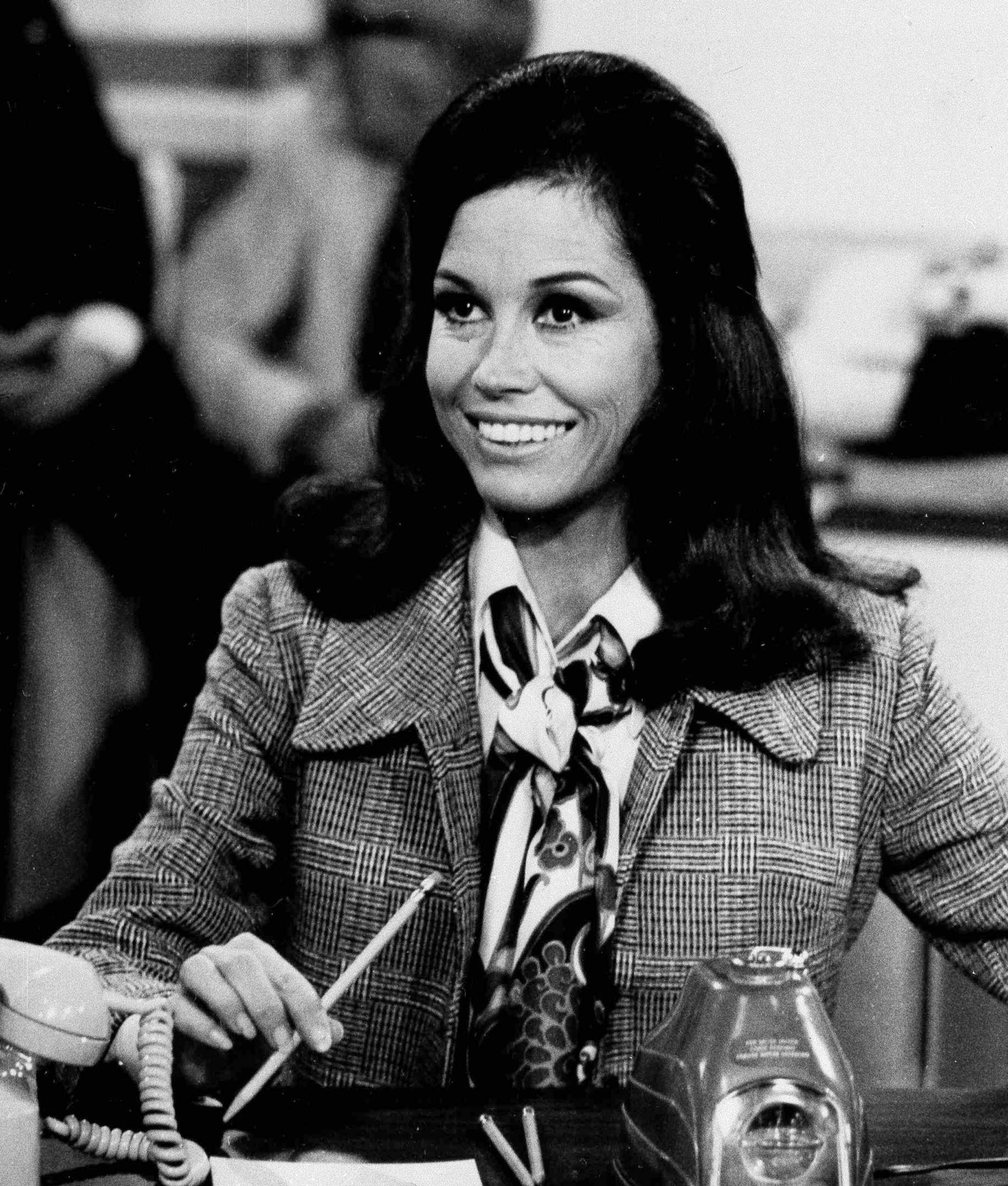 Actress Mary Tyler Moore is shown as TV news producer Mary Richards in a scene from the "The Mary Tyler Moore Show," Aug. 1970 (AP Photo) ORG XMIT: APHS326011