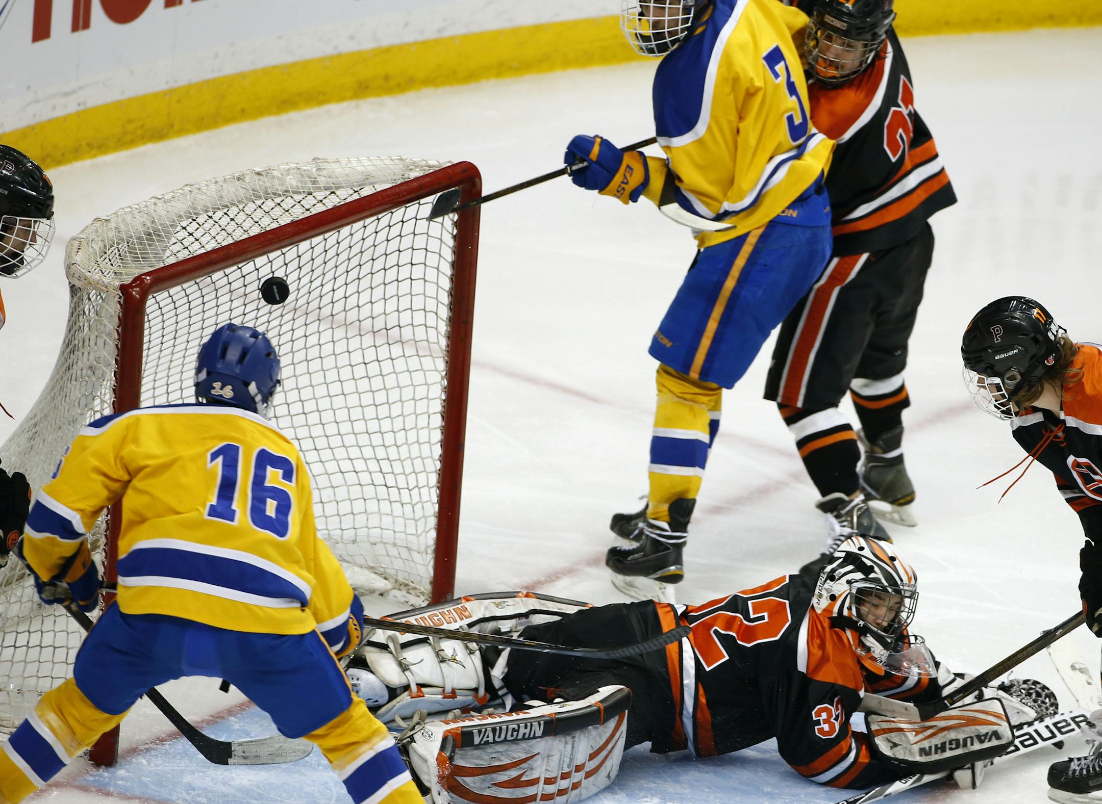 At the Xcel Center in a game between Thief River Falls and Princeton in the high school A quarterfinals hockey playoffs , Gabe Pangerl(32) allowed Princeton's fifth goal .] Richard Tsong-Taatarii/rtsong-taatarii@startribune.com
