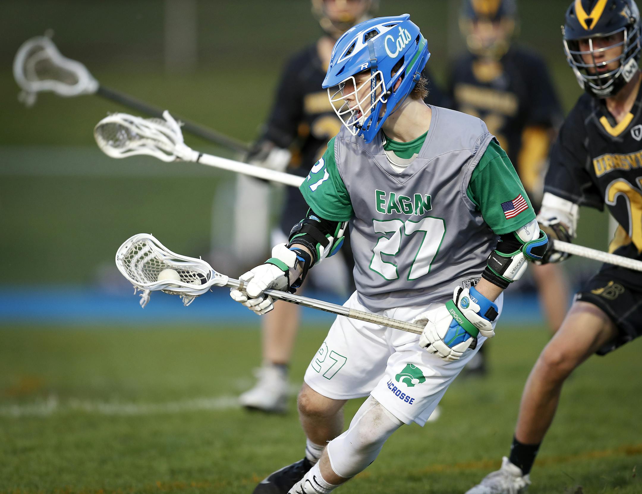 Andrew Wilson of Eagan High School runs with the ball during their game against Burnsville. ] LEILA NAVIDI ï leila.navidi@startribune.com BACKGROUND INFORMATION: The Eagan High School boys lacrosse team plays against Burnsville High School at Eagan High School on Tuesday, May 15, 2018. Eagan won the game 16-1.