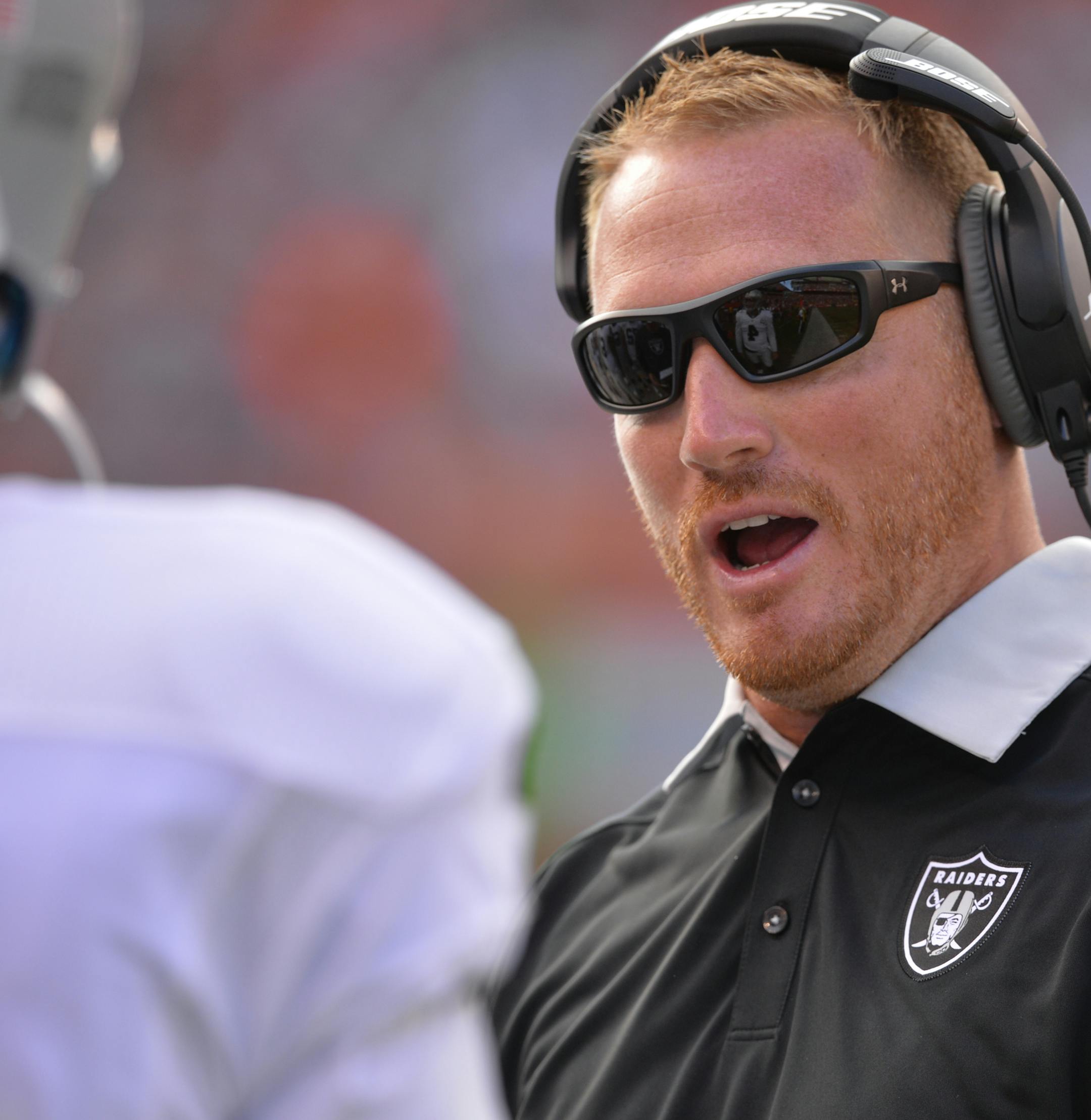 Oakland Raiders quarterbacks coach Todd Downing stands on the sideline during an NFL football game against the Cleveland Browns Sunday, Sept. 27, 2015, in Cleveland. Oakland won 27-20. (AP Photo/David Richard) ORG XMIT: CDS