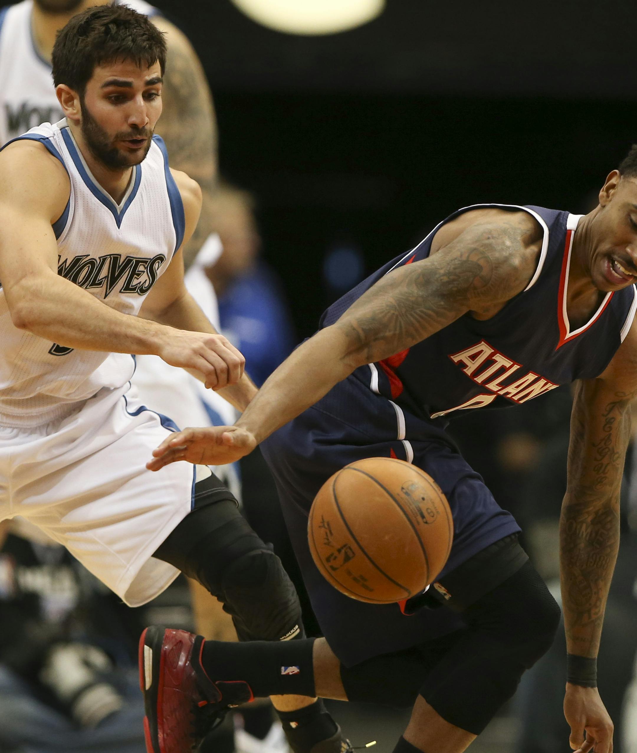 Timberwolves guard Ricky Rubio nearly stripped the ball from Atlanta Hawks guard Jeff Teague in the fourth quarter Monday night at Target Center. ] JEFF WHEELER ‚Ä¢ jeff.wheeler@startribune.com The Timberwolves lost to the Atlanta Hawks 117-105 in an NBA game at Target Center Monday night, February 9, 2015.