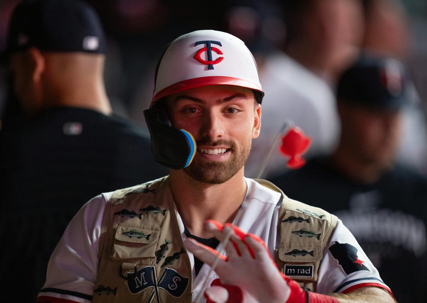 Edouard Julien donned the "Land of 10,000 Rakes" fishing vest in the dugout after his eighth-inning pinch-hit homer put the Twins ahead for good in an 8-4 victory over the Royals at Target Field on Monday night.