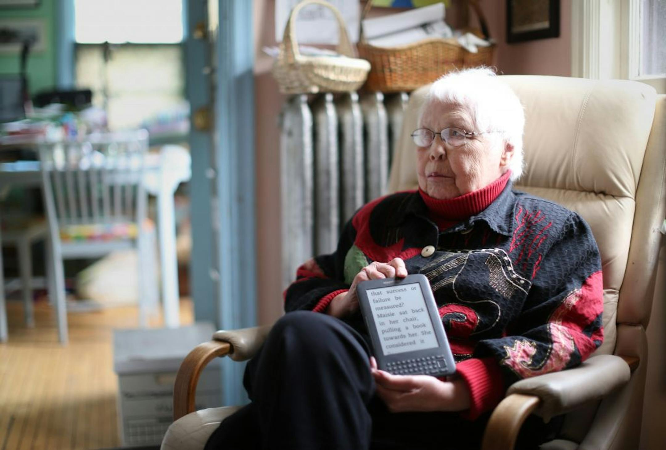 Phebe Hanson, who is blind in one eye, can now relax when she reads on her Kindle because she can read at a large font size. She has 175 books on her e-reader, which she got on her 81st birthday. She was photographed at home on Monday, April 30, 2012 in Minneapolis, Minn.