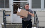 Sgt. Dave Strecker with the St. Paul Police Department retrieved a package containing a GPS tracker in it that was placed on a resident's front steps 