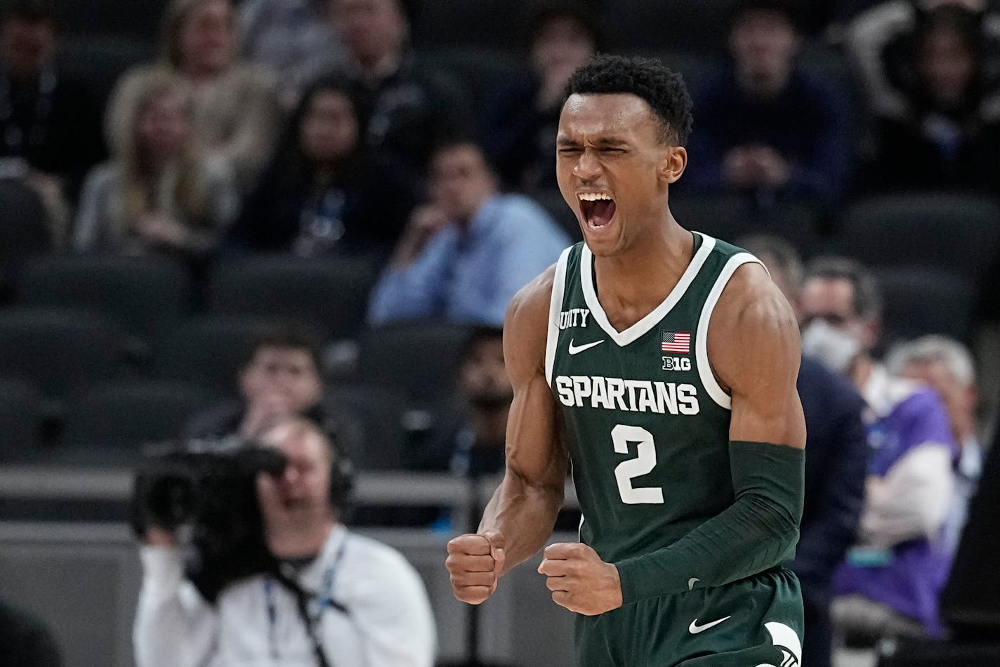 Michigan State's Tyson Walker reacts after Michigan State defeated Wisconsin in an NCAA college basketball game at the Big Ten Conference men's tournament Friday, March 11, 2022, in Indianapolis. (AP Photo/Darron Cummings)