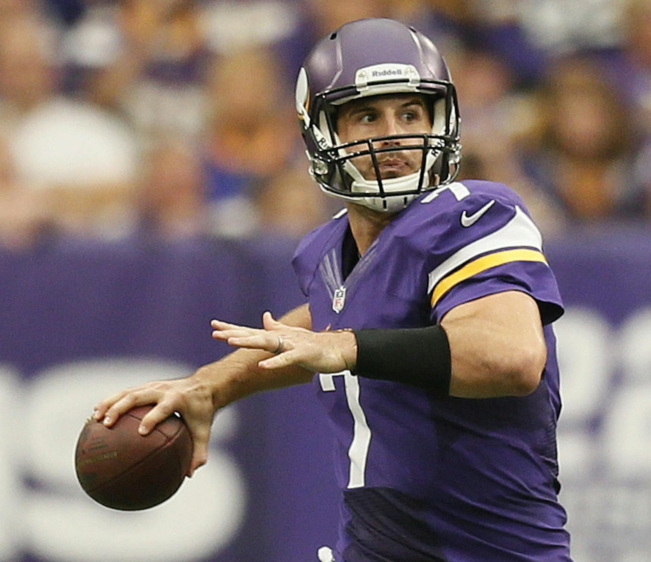 Vikings quarterback Christian Ponder scrambled before throwing a deep imcomplete pass to Jerome Simpson in the fourth quarter.