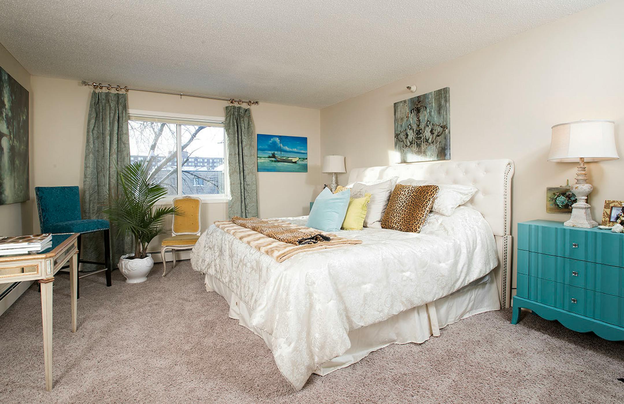 Hunter's bedroom features a new headboard on a bed frame from her previous house.