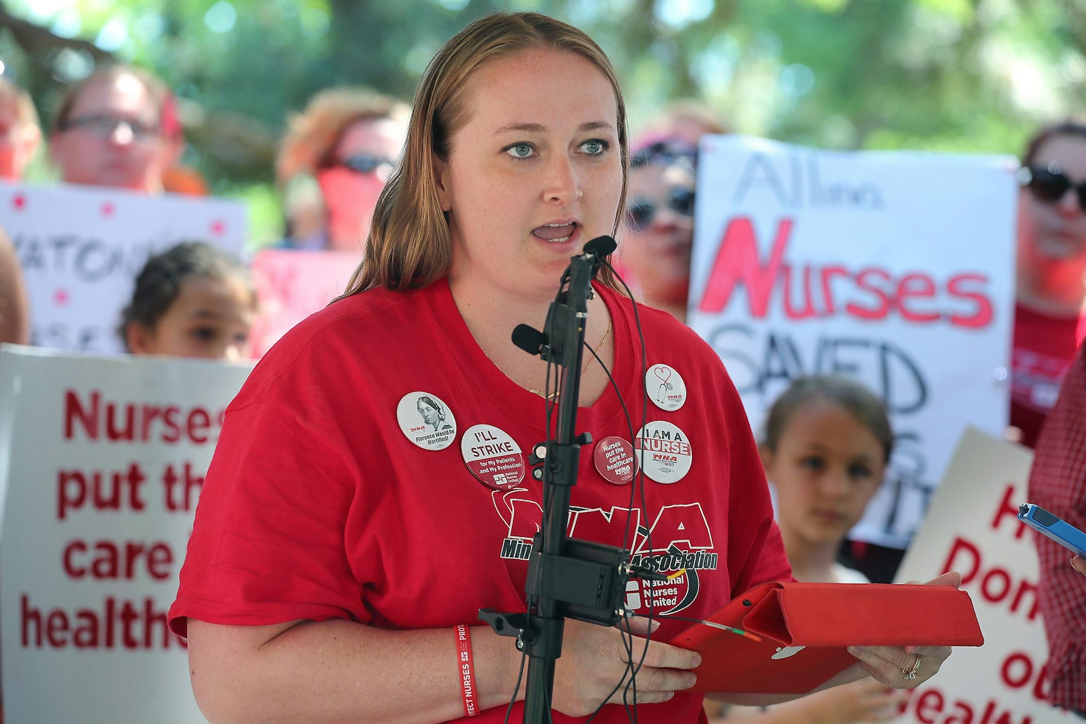 Angela Becchetti, an Abbott Northwestern nurse on the bargaining committee spoke on behalf of the Minnesota Nurses Association outside Abbott Northwestern Hospital as they continued their strike, Monday, June 20, 2016 in Minneapolis, MN.