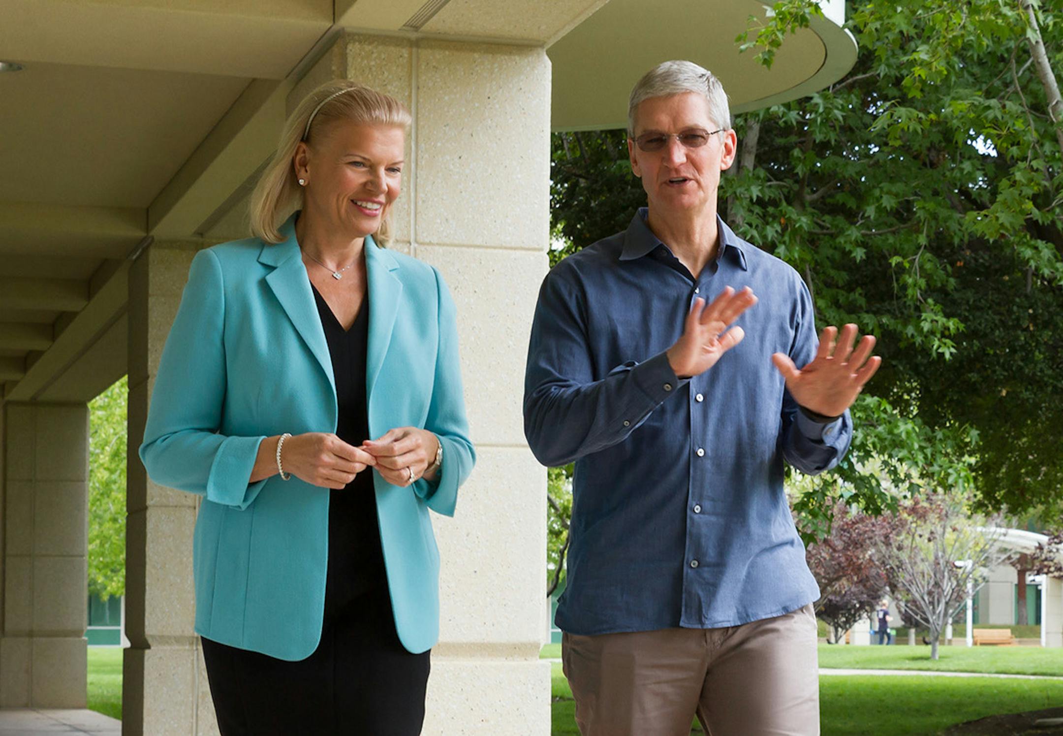 **COMMERCIAL IMAGE** In this photo distributed by Feature Photo Service for IBM: At Apple Inc's headquarters in Cupertino, California on Tuesday, July 15, 2014, Apple CEO Tim Cook and IBM CEO Ginni Rometty announced a global strategic partnership to redefine the way work gets done by transforming the way businesses and employees use mobile technology through a new class of business apps that bring IBM's big data and analytics capabilities to iPhone and iPad. The new mobile business apps for iOS