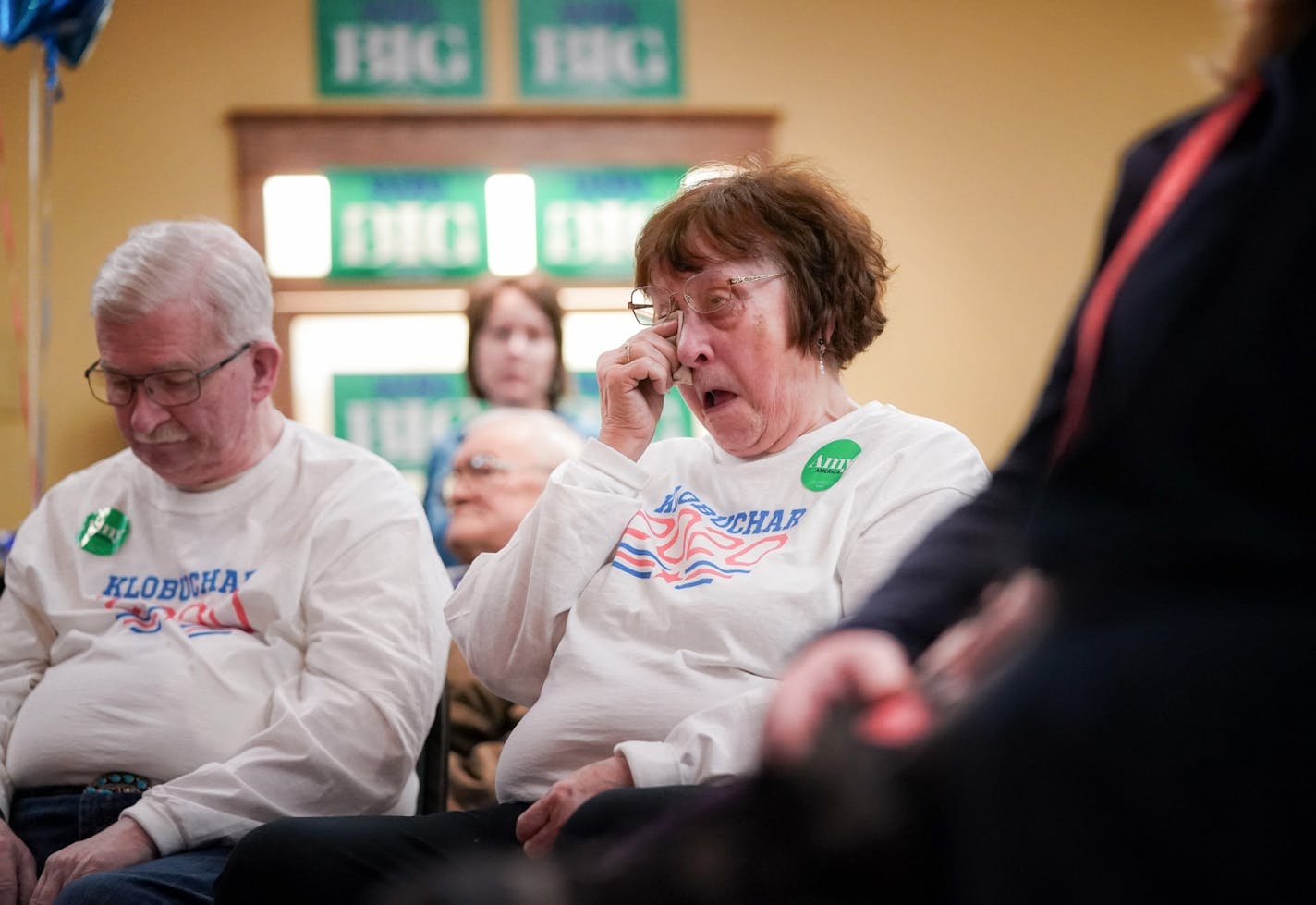 Nancy Roddy of Mason City, Iowa, wiped away tears as Sen. Amy Klobuchar spoke about her solutions to the nation's problems on Sunday, Feb. 2, in Mason City.