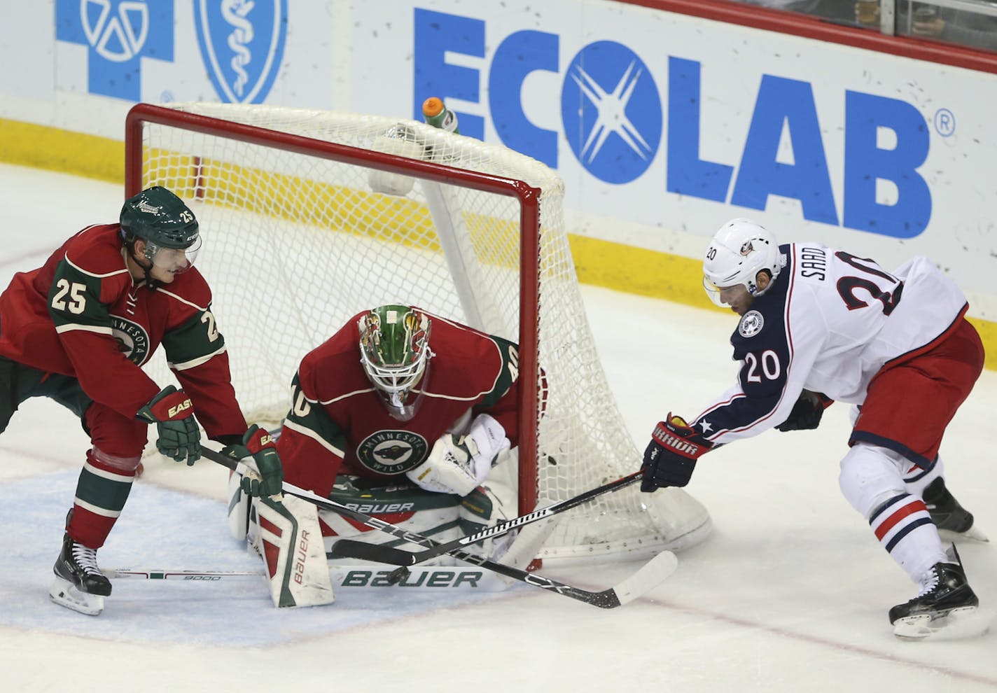 With some help from defenseman Jonas Brodin (25), Wild goalie Devan Dubnyk stopped a wraparound attempt by Blue Jackets left wing Brandon Saad in the second period Thursday night. ] JEFF WHEELER &#xef; jeff.wheeler@startribune.com The Minnesota Wild hosted the Columbus Blue Jackets in an NHL game Thursday night, October 22, 2105 at Xcel Energy Center in St. Paul.