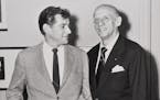 Leonard Bernstein and Dimitri Mitropoulos photographed together in New York City on the day they signed a contract to be principal conductors for the 