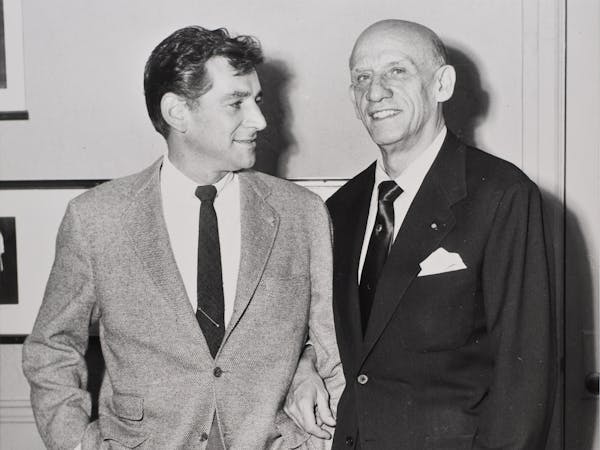 Leonard Bernstein and Dimitri Mitropoulos photographed together in New York City on the day they signed a contract to be principal conductors for the 