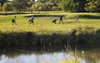 Golfers walked the course near the edge of Pond E at Hiawatha Golf Course Wednesday afternoon. ] Aaron Lavinsky &#x2022; aaron.lavinsky@startribune.co