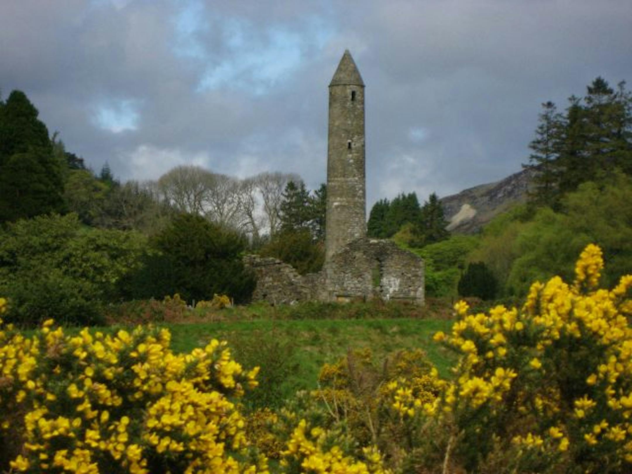 The Round Tower at Glendalough dates to the 10th century. It stands 103 feet tall and was originally a bell tower, used to call monks to prayer.