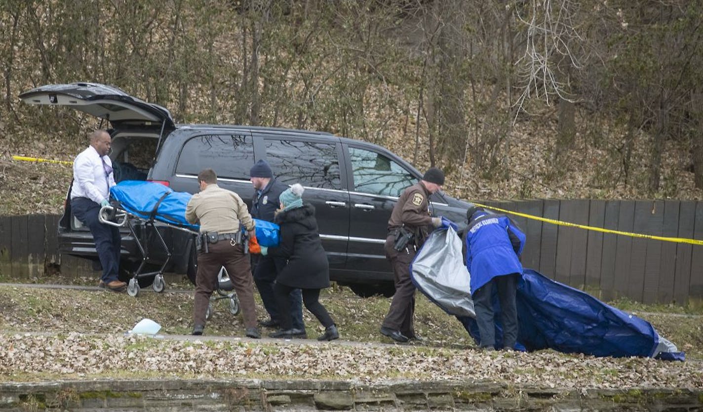 Local law enforcement removed a body from the channel linking Lake of the Isles and Bed Make Ska Lake, Tuesday, November 26, 2019 in Minneapolis, MN.