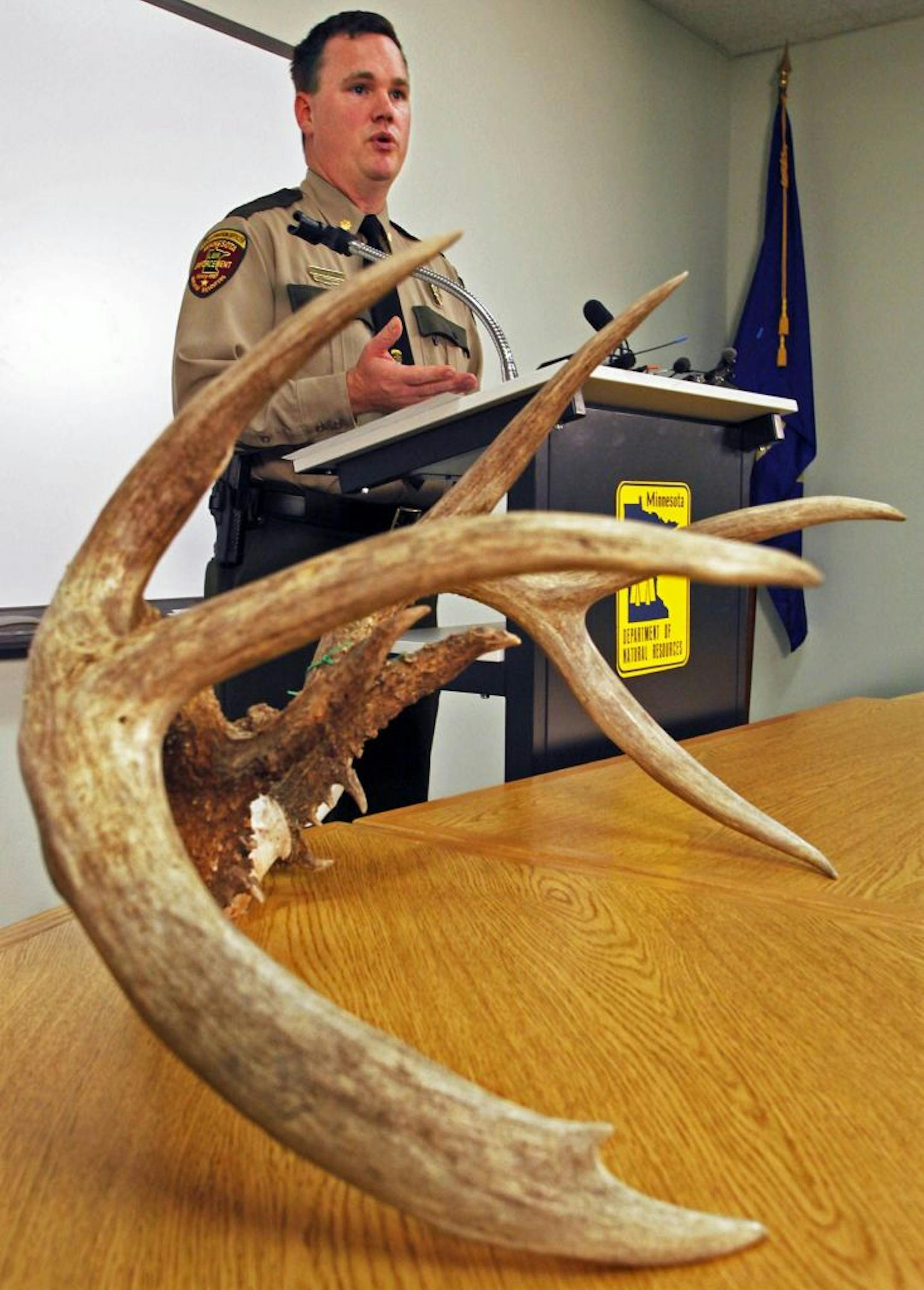 DNR Major Rod Smith exhibited antlers from a deer killed by a man charged with poaching in 2009.