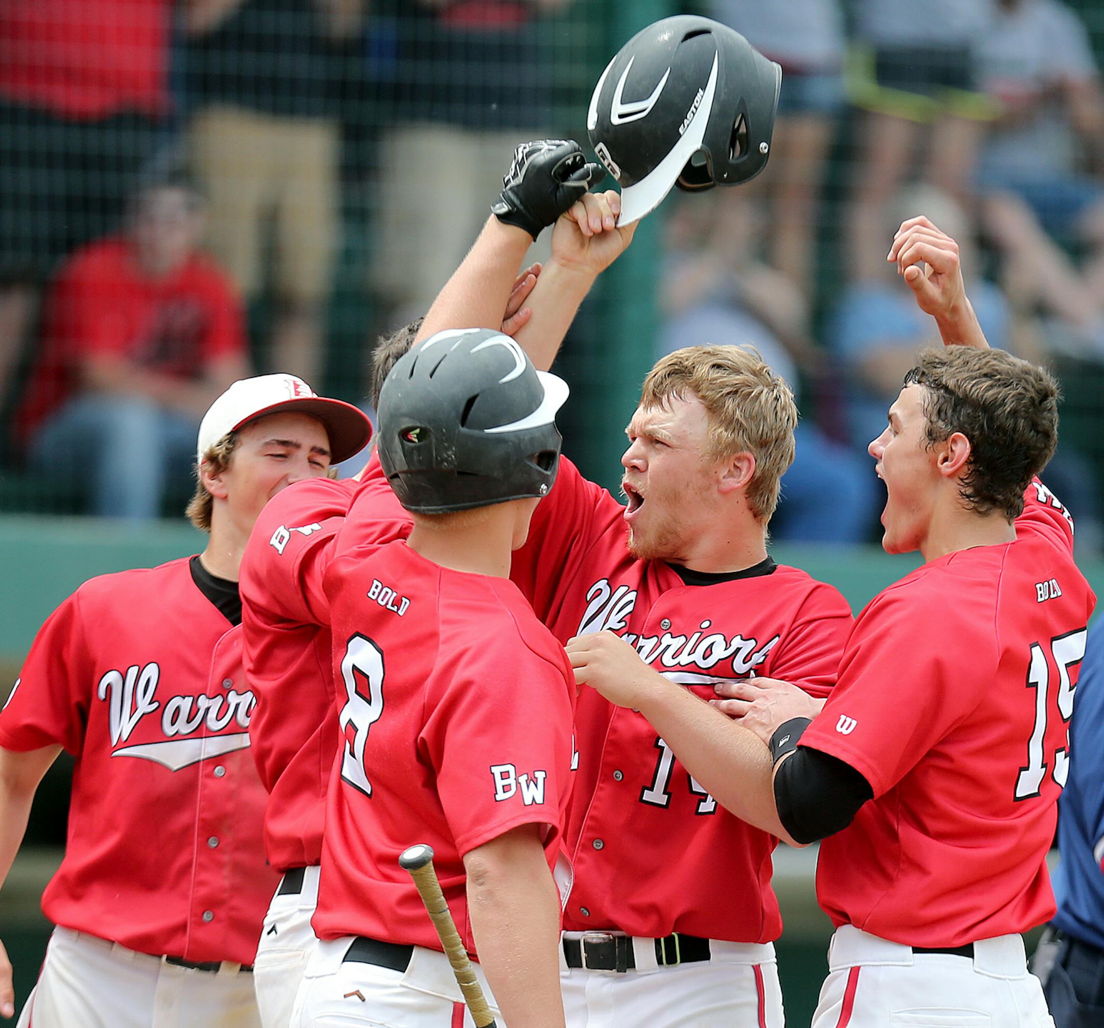 Olivia Bold's Logan Sandgren, center, is congratulated after hitting a two-run homer in the top of the fifth inning during Class A State Baseball Semifinal Action, Friday, June 14, 2013 in Jordan, MN. Olivia Bold defeated St. Agnes 12-3. (ELIZABETH FLORES/STAR TRIBUNE) ELIZABETH FLORES • eflores@startribune.com