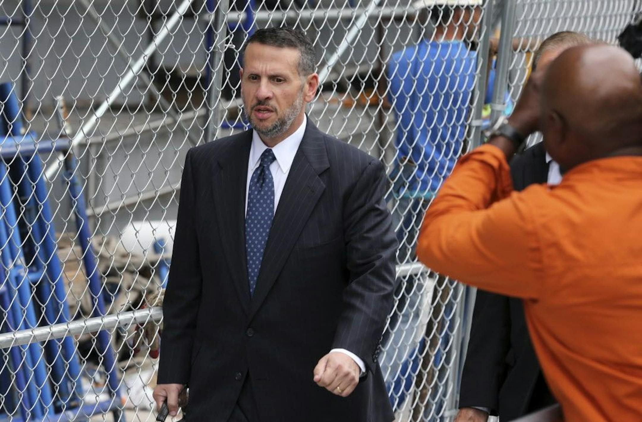 David Wildstein leaves Martin Luther King Jr. Federal Courthouse after a hearing, Monday, Sept. 26, 2016, in Newark, N.J. Wildstein, pleaded guilty last year to orchestrating traffic jams in 2013 to punish a Democratic mayor who didn't endorse Gov. Chris Christie. Three years after gridlock paralyzed a New Jersey town next to the George Washington Bridge for days, two former allies of Christie, Bill Baroni and Bridget Kelly, are being tried. Monday, Sept. 26, 2016, in Newark, N.J.