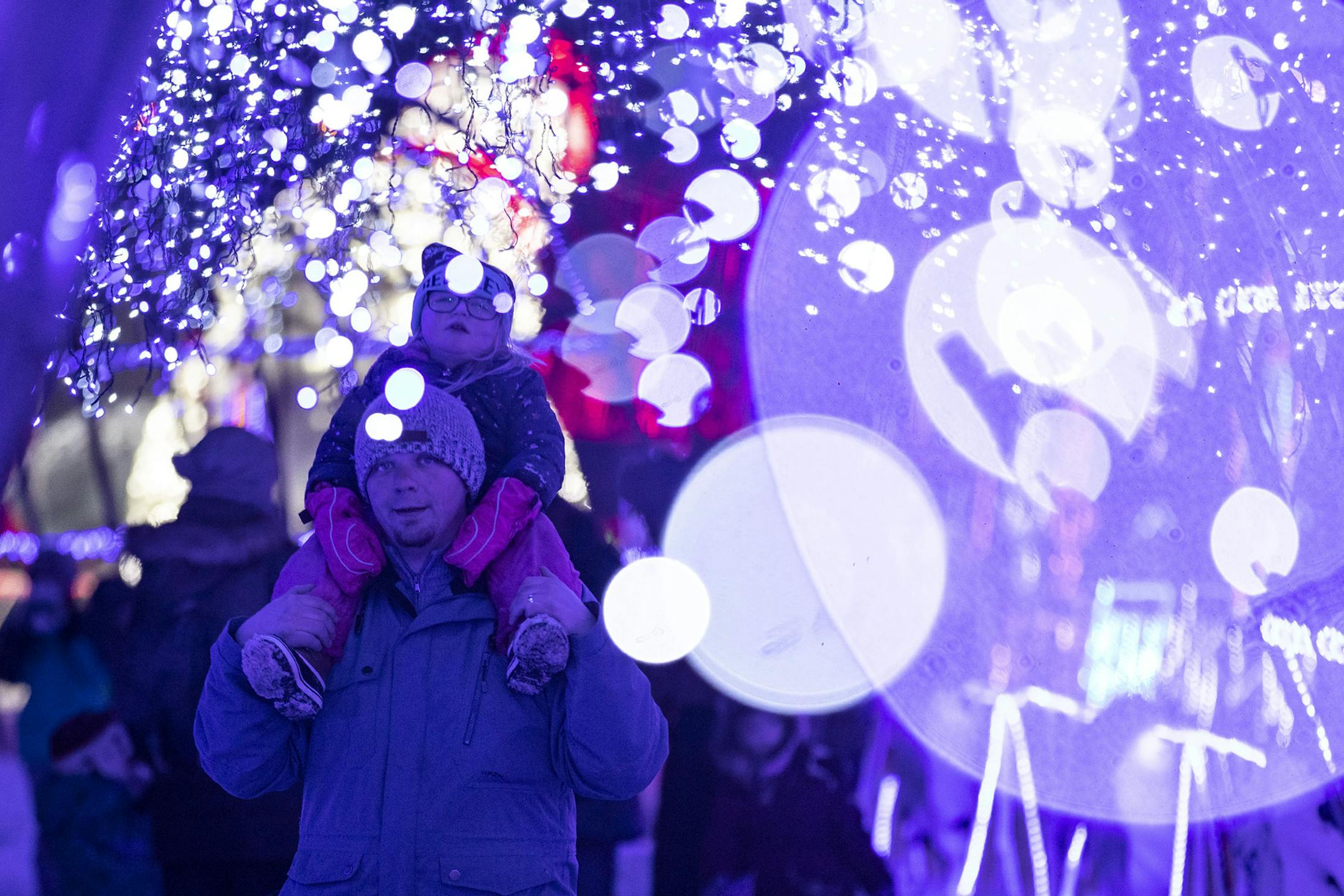 John Rentschler walked through a light tunnel with his three-year-old daughter, Jacey, on his shoulders in Bentleyville on Tuesday December 3, 2019. ]
ALEX KORMANN • alex.kormann@startribune.com Bentleyville in Duluth, MN has the old Dayton's animatronic figures on display in faux TV sets and above their popcorn stand. These animatronics are favorites of people that visit the Christmas lights display.