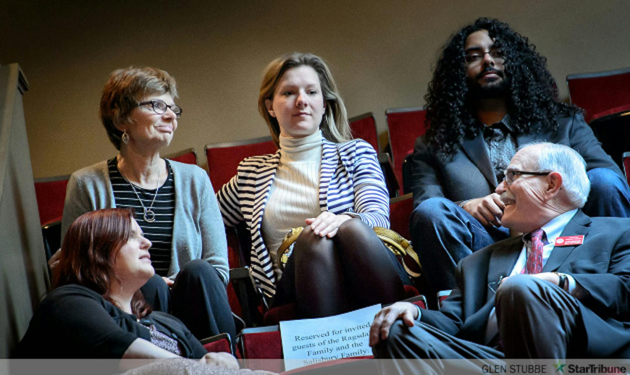 Jim Ragsdale's widow Mary and his daughter Catherine, center talked with Bill Salisbury, right and his daughter Rachael, left in the Senate Gallery.       ] GLEN STUBBE * GSTUBBE@STARTRIBUNE.COM Friday, February 2, 2015  Reporters Jim Ragsdale and Bill Salisbury were honored from the Minnesota Senate floor today by Sen. Richard Cohen and Majority Leader Tom Bakk.
