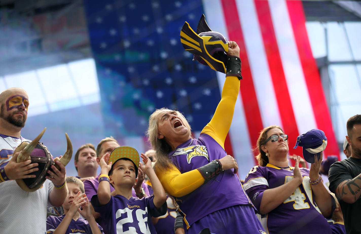 Steve Bayle cheered as the Vikings were introduced at U.S. Bank Stadium on Sunday.