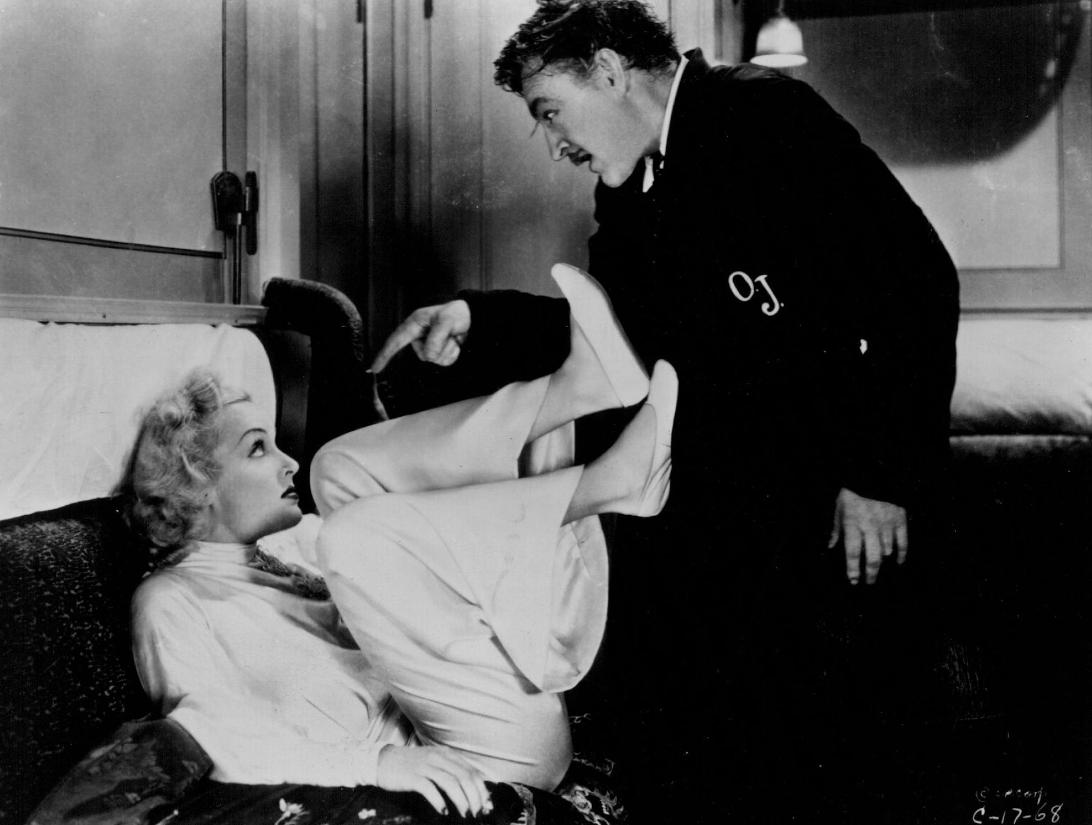 May 24, 1985 Critic's choice/Movies - Carole Lombard lets her feet do her talking in this famous scene from "Twentieth Century," one of the funniest screwball comedies of the 1930s. That's the Great Profile, John Barrymore, in the monogrammed pajamas. She plays a famous movie star, he a washed-up Broadway producer, and they find themselves traveling on the same train from Chicago to New York . The Howard Hawks film will be shown at 8 p.m. Tuesday at the Weyerhaeuser Auditorium as part of the Min