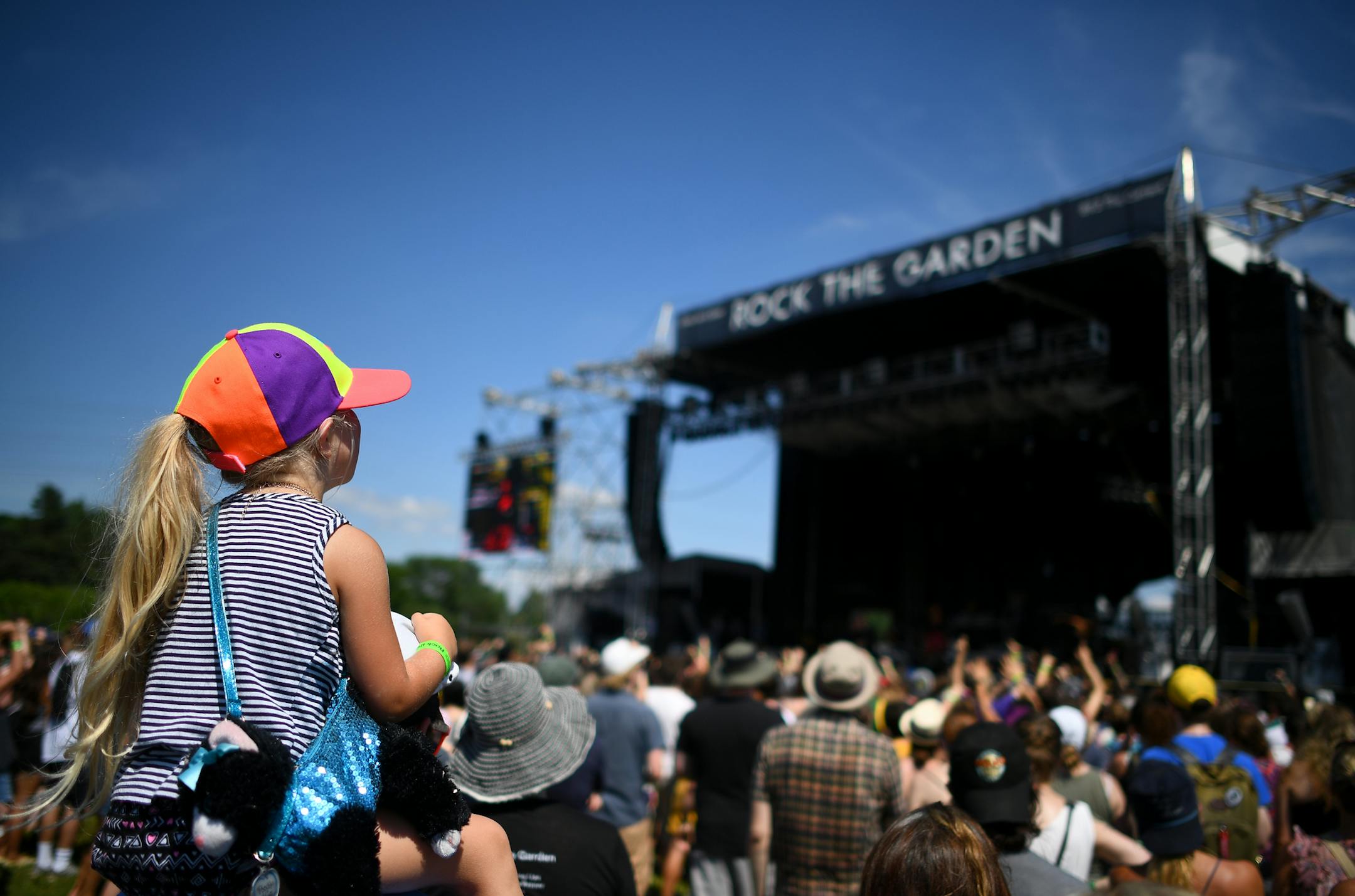 Orla Leonhardt, 4, of St. Peter, was perched up on the shoulders of her father, Tom, as they watched Grrrl Prty Saturday at Rock the Garden at Boom Island Park. ] (AARON LAVINSKY/STAR TRIBUNE) aaron.lavinsky@startribune.com Rock The Garden was held at Boom Island Park on Saturday, June 18, 2016 in Minneapolis, Minn. Acts included Grrrl Prty, Nathaniel Rateliff & Night Sweats, Hippo Campus, Chance the Rapper and the Flaming Lips.