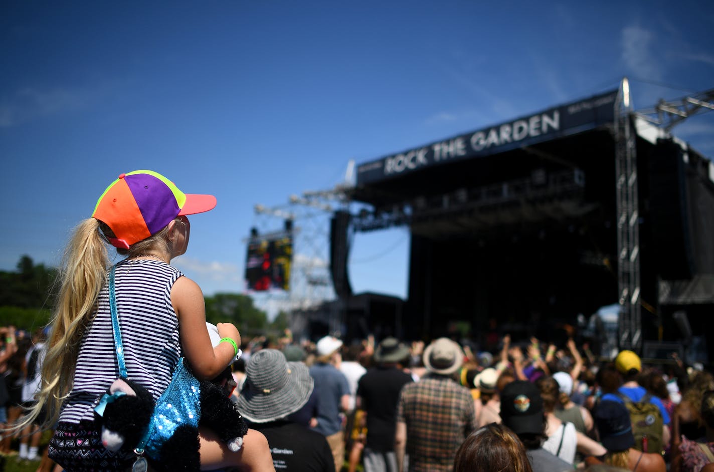 Orla Leonhardt, 4, of St. Peter, was perched up on the shoulders of her father, Tom, as they watched Grrrl Prty Saturday at Rock the Garden at Boom Island Park. ] (AARON LAVINSKY/STAR TRIBUNE) aaron.lavinsky@startribune.com Rock The Garden was held at Boom Island Park on Saturday, June 18, 2016 in Minneapolis, Minn. Acts included Grrrl Prty, Nathaniel Rateliff & Night Sweats, Hippo Campus, Chance the Rapper and the Flaming Lips.