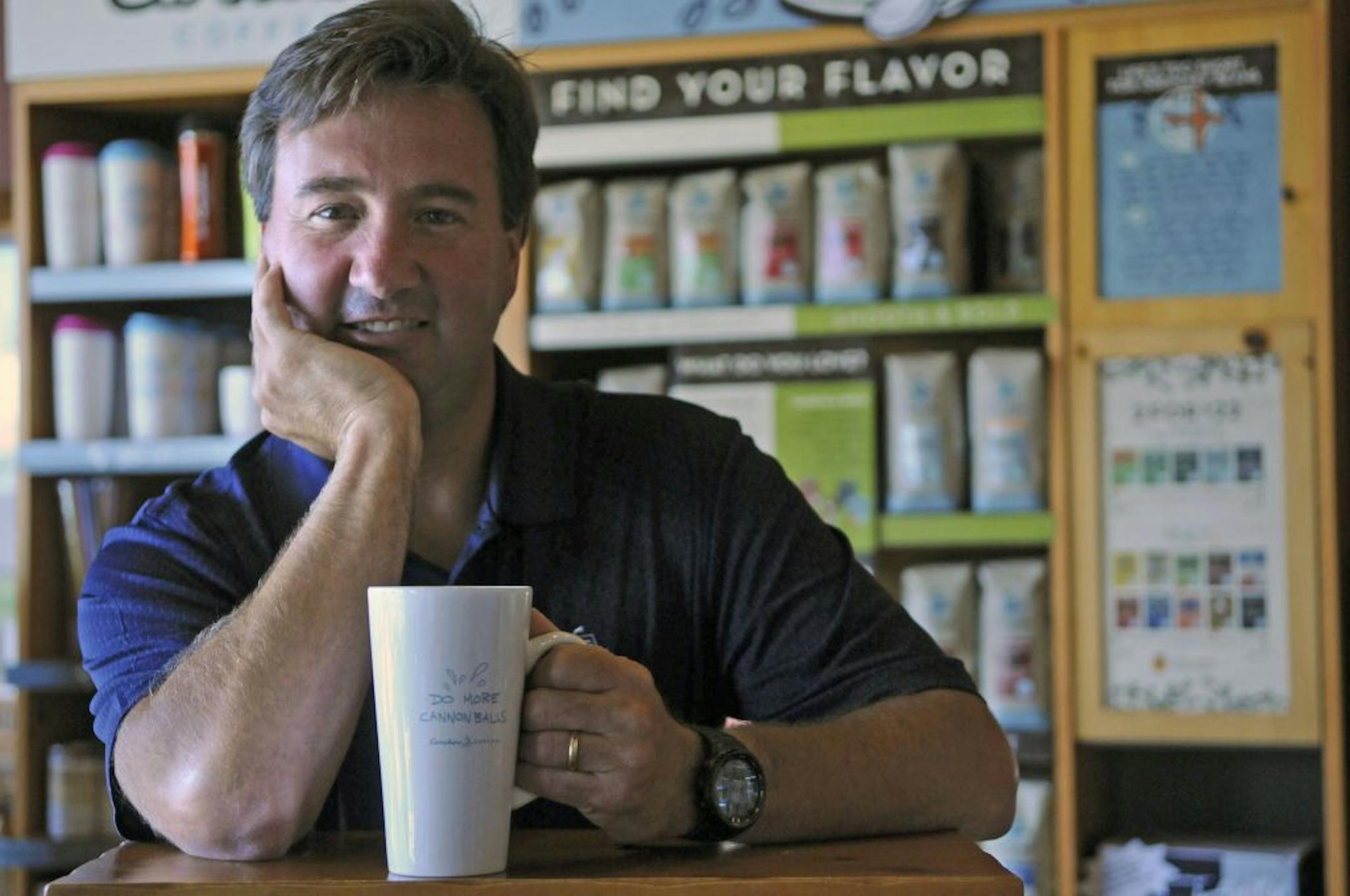 Michael Tattersfield CEO of Caribou Coffee has been leading the company on a path of rapid growth.He talked about the present and future during an interview on Wednesday, 7/6/2011 at Caribou Coffee Headquarters in Brooklyn Center, Minn.This portrait was made in a Caribou Coffee shop attached to the headquarters.