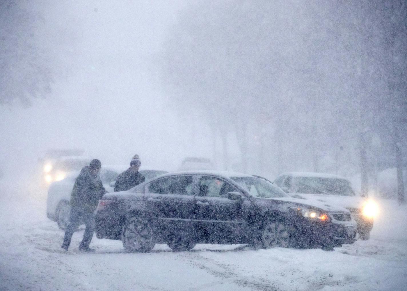 This scene was repeated many times throughout Minnesota in Monday's snowstorm.