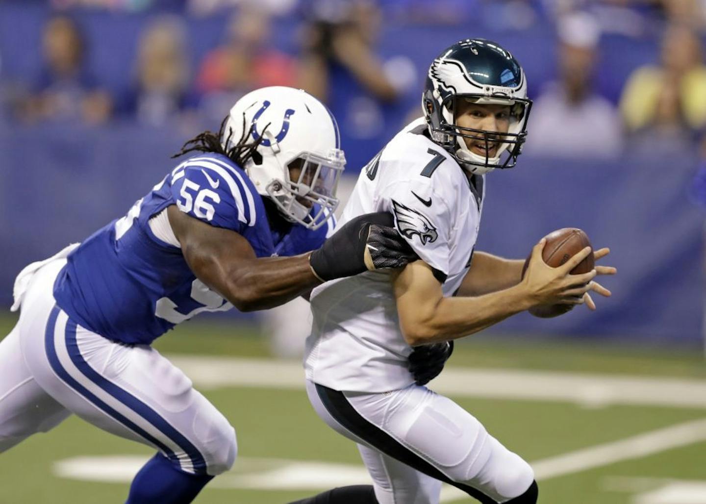 Indianapolis Colts inside linebacker Nate Irving (56) sacks Philadelphia Eagles quarterback Sam Bradford (7) during the first half of an NFL preseason football game in Indianapolis, Saturday, Aug. 27, 2016.