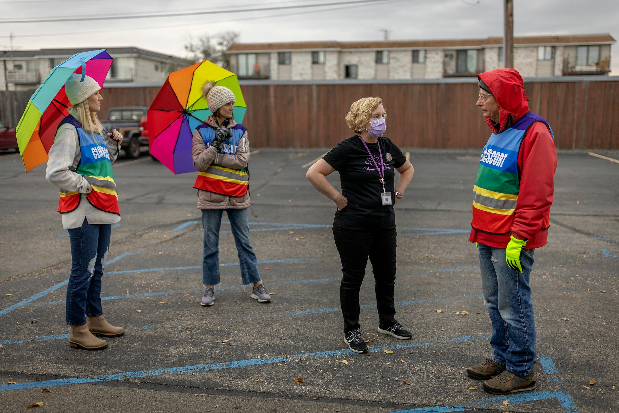 Red River Women's Clinic Director Tammi Kromenaker checked in with her security outside the clinic in Moorhead.
