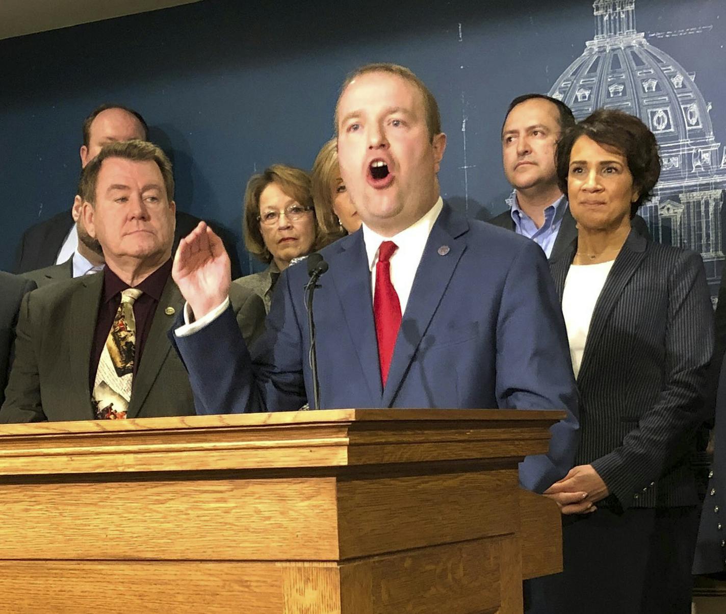 Minnesota State Rep. Nick Zerwas and other Minnesota House Republicans announce a proposal at the state Capitol on Monday, March 25, 2019, that will crackdown on fraud in the state's Child Care Assistance Program. The bill announced Monday comes in response to a recent report by the legislative auditor that found significant fraud within the child care program, which helps low-income parents afford care while they work or attend school. The auditor was unable to put a dollar figure on the fraud.